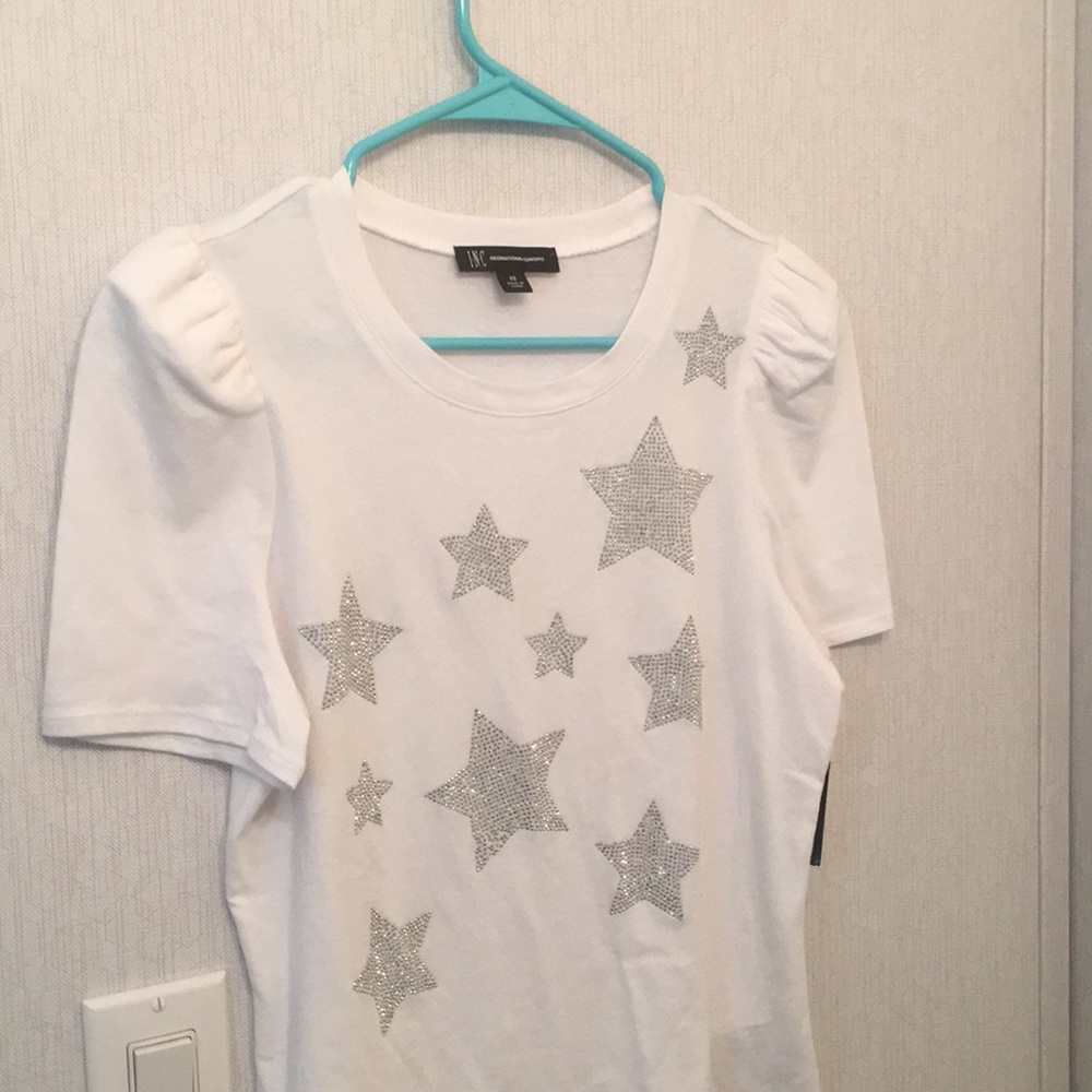 White shirt with silver stars